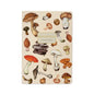 Mushrooms On White Notebook